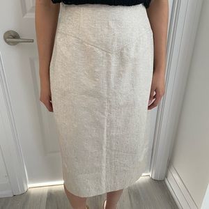 Shimmering pencil skirt.